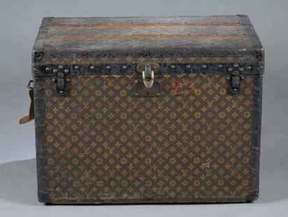 Louis Vuitton monogram steamer trunk.: A Louis Vuitton Monogram Steamer trunk, Circa 1914-1924. Louis Vuitton monogram pattern and personal monogram on each side. Metal side handles and front clasps. Marked on front lock handles. Wheels