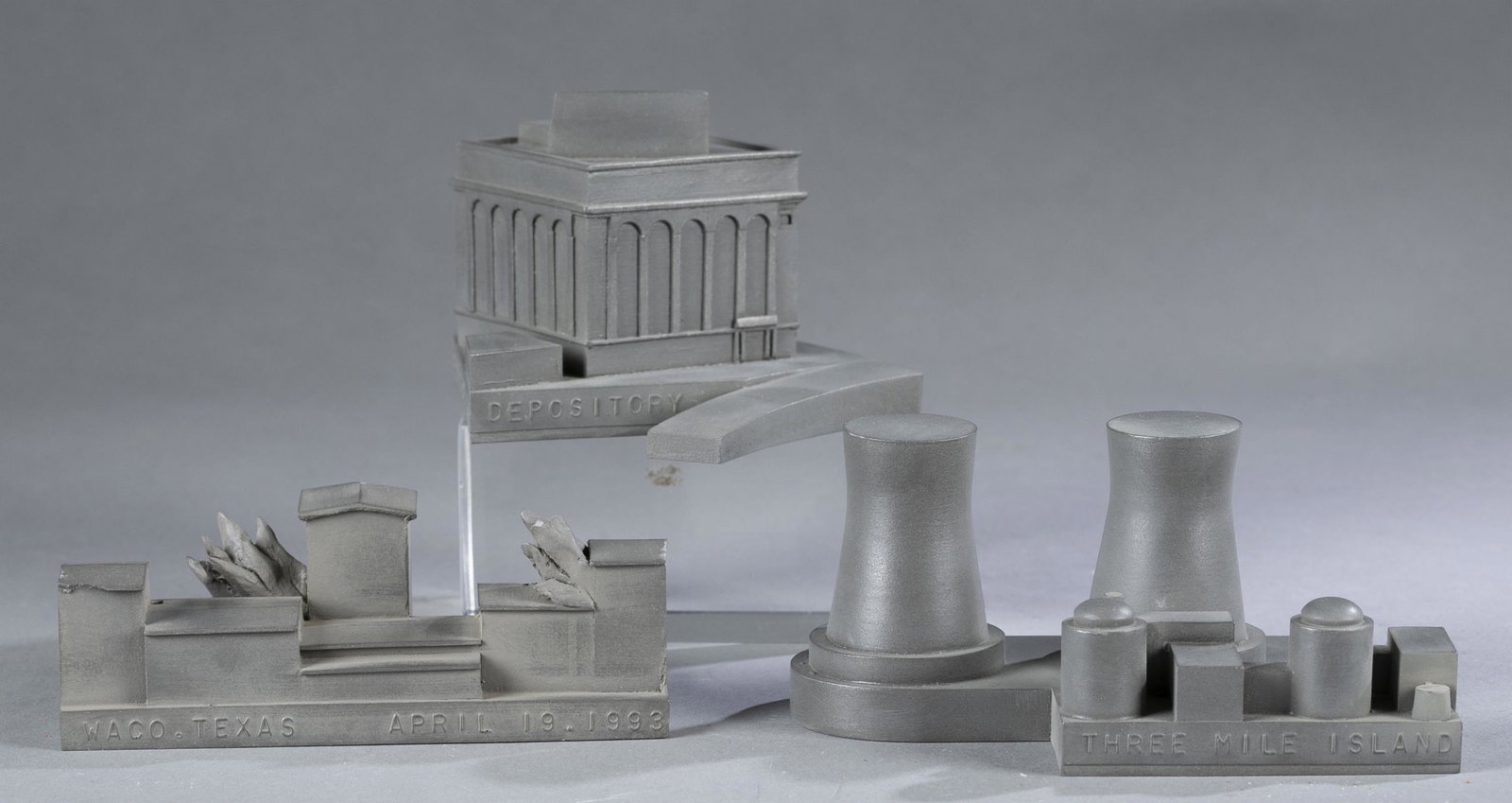 3 Boym, "Buildings of Disaster" series sculptures.: A group of three Constantin & Laurene Boym "Buildings of Disaster" series nickel alloy and patination sculptures. ++ Three Mile Island, March 28, 1979 sculpture. Boym Partners Inc. label dated 2004 on