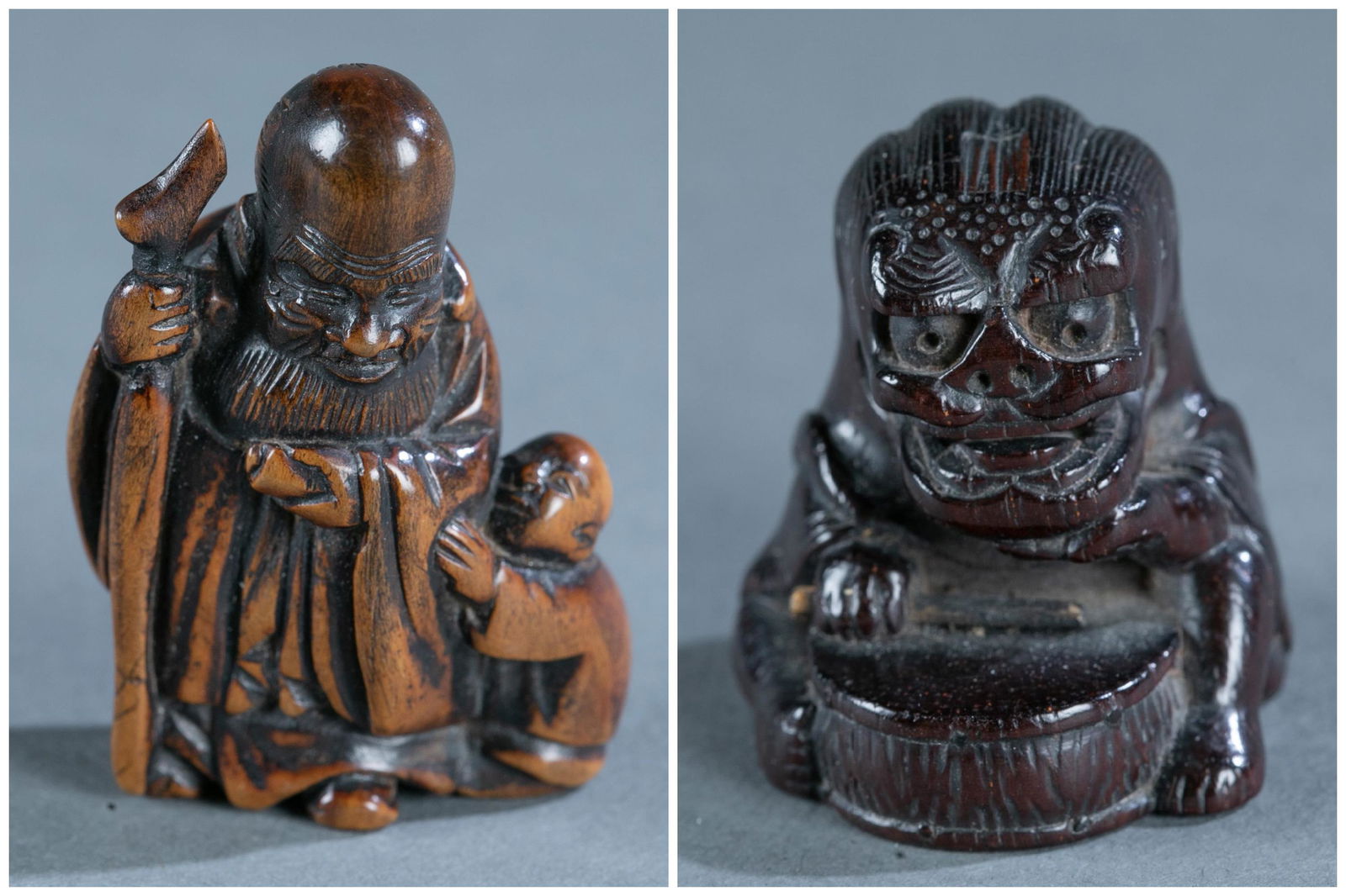 2 Japanese wood netsuke.: A group of two Japanese wood netsuke. Including a wood netsuke of a boy wearing Shishi mask. Sitting on the ground beating a drum. Signed Kashu. 1 1/2" x 1 1/4". Wood netsuke of Fukuro and Karako, pro