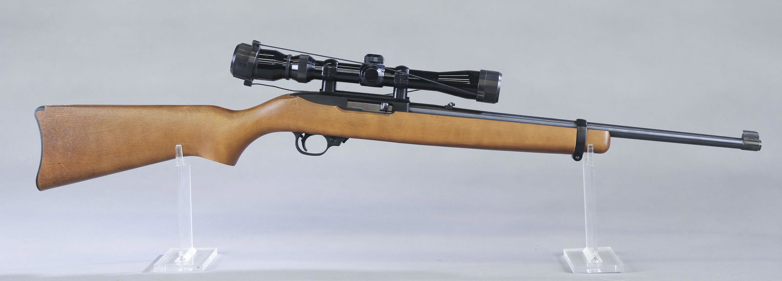 Strum, Ruger, & Co. 10/22 semi auto carbine, .22LR: Strum, Ruger, & Co. 10/22 semi automatic carbine, .22LR. 18 1/2" blued barrel. Birch rounded grip low comb stock. Includes TASCO Silver Antler 3-9x40 rifle scope and ten round rotary magazine. 242- 95