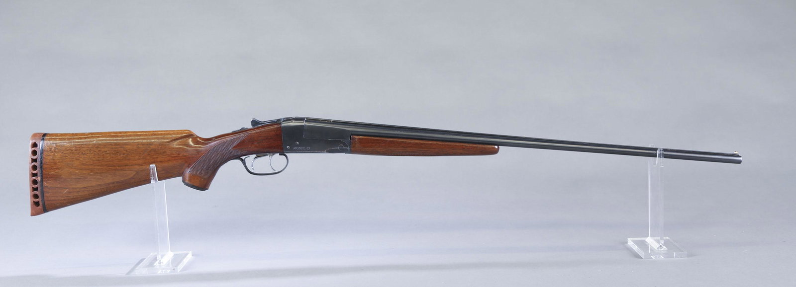 H & D Folsom Whippet sxs shotgun, .410.: H & D Folsom Arms Company Whippet Model CC side by side shotgun, .410 bore. 26" blued round barrels. Choked Full. Blued box lock. Walnut semi pistol grip stock with checkered wrist and rubber recoil p