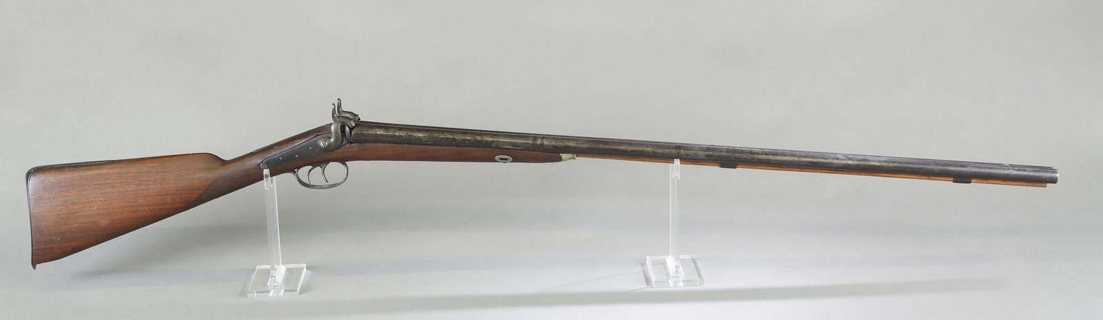 Partridge percussion sxs shotgun, 16 gauge.: Partridge percussion side by side shotgun, 16 gauge. Circa 1840s. 34" barrel unmarked. Back lock action marked "Partridge Warranted." Walnut straight wrist stock with checkered wrist. 14 1/2" length o