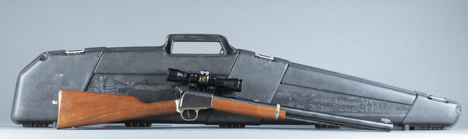 Thompson/ Center Arms Scout carbine, .50 cal.: Thompson/ Center Arms black powder percussion Scout carbine, .50 caliber. Blued finish. 24" barrel. Brass trigger guard frame. Walnut stock. Includes Thompson Center Hawken Hunter muzzleloader rifle s