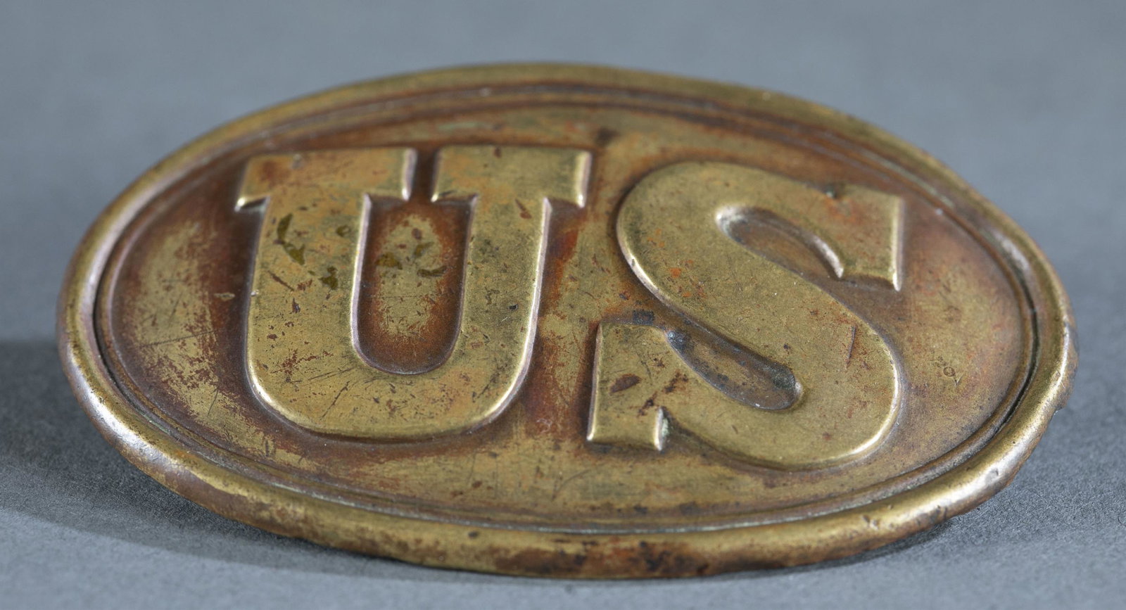 Civil War U.S. Union belt buckle.: Civil War U.S. Union belt buckle. Lead filled brass with three hook design. 3 3/8" x 2 1/8". Provenance: From the collection of Nicholas R. Burke, Washington D.C.