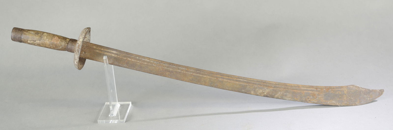 Chinese ox-tail dao sword.: Boxer Rebellion era Chinese ox-tail dao sword, Late 19th Century. Single edged blade, cupped crossguard, carved wood grip, and metal pommel. Partial export wax seal. 28" blade 35 1/2" overall. Conditi