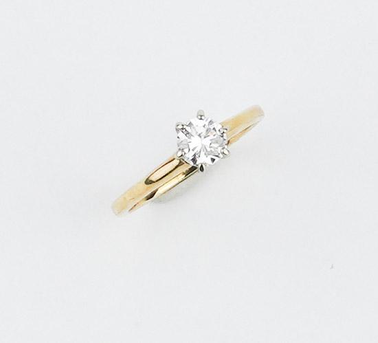 .55ct Diamond Solitaire in 14KYG Mounting: .55ct Diamond Solitaire in 14KYG solitaire six prong mounting size 5.5, gross weight approx. 1.15dwt