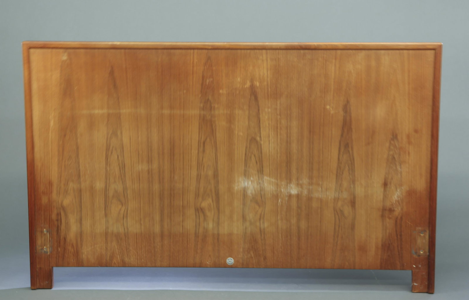 Falster teak headboard.: A Falster teak wood headboard. Marked. Made in Denmark. 34" x 55 1/4" x 1 1/4". Provenance: From the collection of Virginia K. Saba.