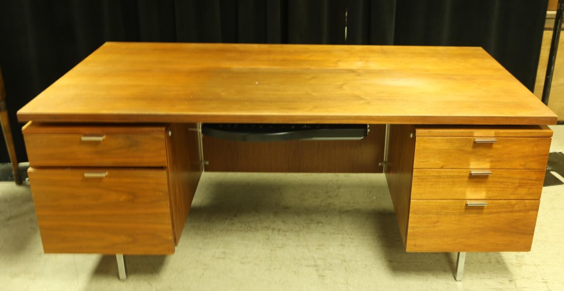 George Nelson Herman Miller desk.: George Nelson for Herman Miller executive desk. Five drawers raised on chrome legs. 29'' x 71'' x 35''