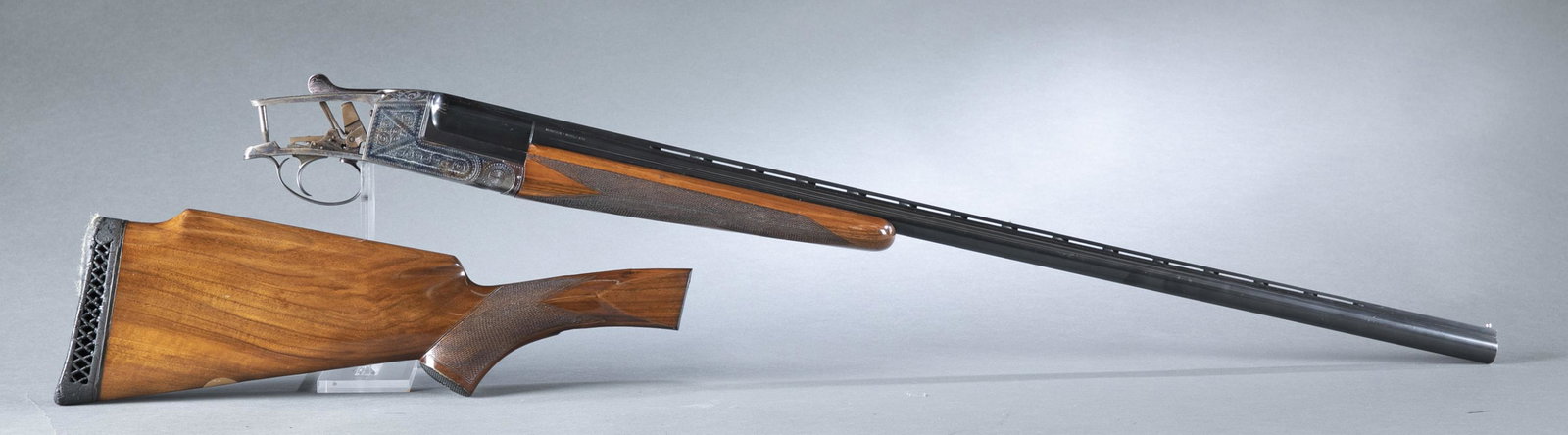 Italian R. Gamba M496 trap shotgun, 12 gauge: Italian R. Gamba for Mauser Bauer Model 496 single barrel trap shotgun with broken stock, 12 gauge. 32" barrel with Gardone with two beads sights on raised rail. Italy proof marks. marked "MAUSER=BAUE