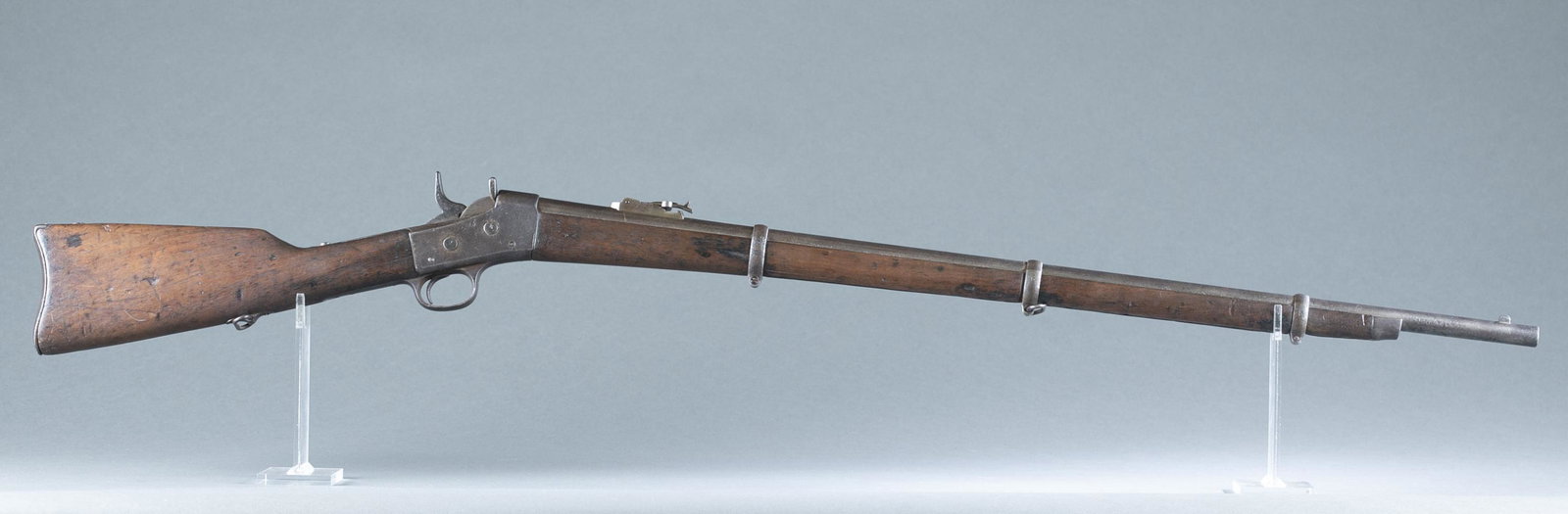 Remington Rolling Block No. 1 rifle, .43 Spanish: Remington Arms Co. Rolling Block No. 1 military rifle, .43 Spanish. 35" barrel with late rear ladder sight. Full length three band stock, 50 1/2" overall. THIS IS AN ANTIQUE FIREARM UNDER THE NATIONAL