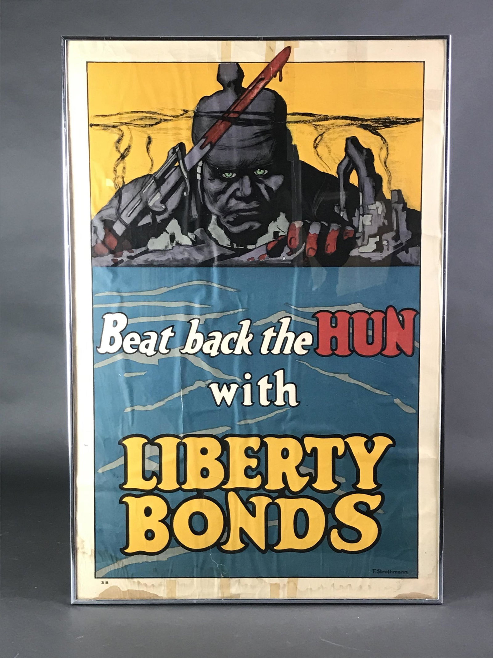 Beat Back the Hun With Liberty Bonds. Poster.: [Poster] Beat Back the Hun With Liberty Bonds. Poster designed by Frederick Strothmann (American 1872 - 1958). Color lithograph. Framed. 20 x 30in. Condition: Fair. Damp staining and taped tears. Buck