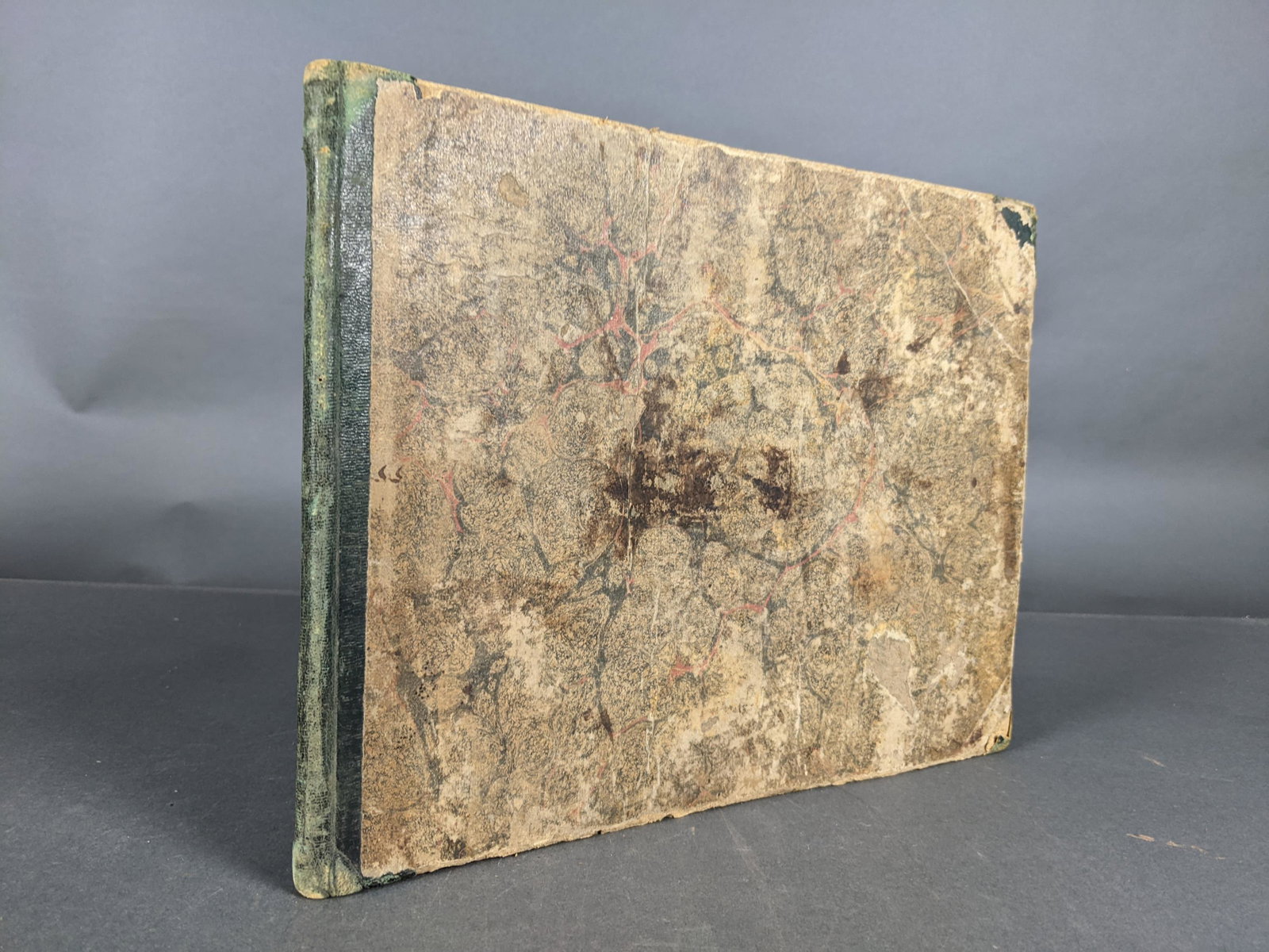 Early American Music Book of Patriotic Airs c.1815: [Manuscript/Ephemera] Early Manuscript American Music-Book of Patriotic Airs and other song, c. 1815. Notes and rests on music-ruled lines for a variety of songs from the War of 1812 including Decatur