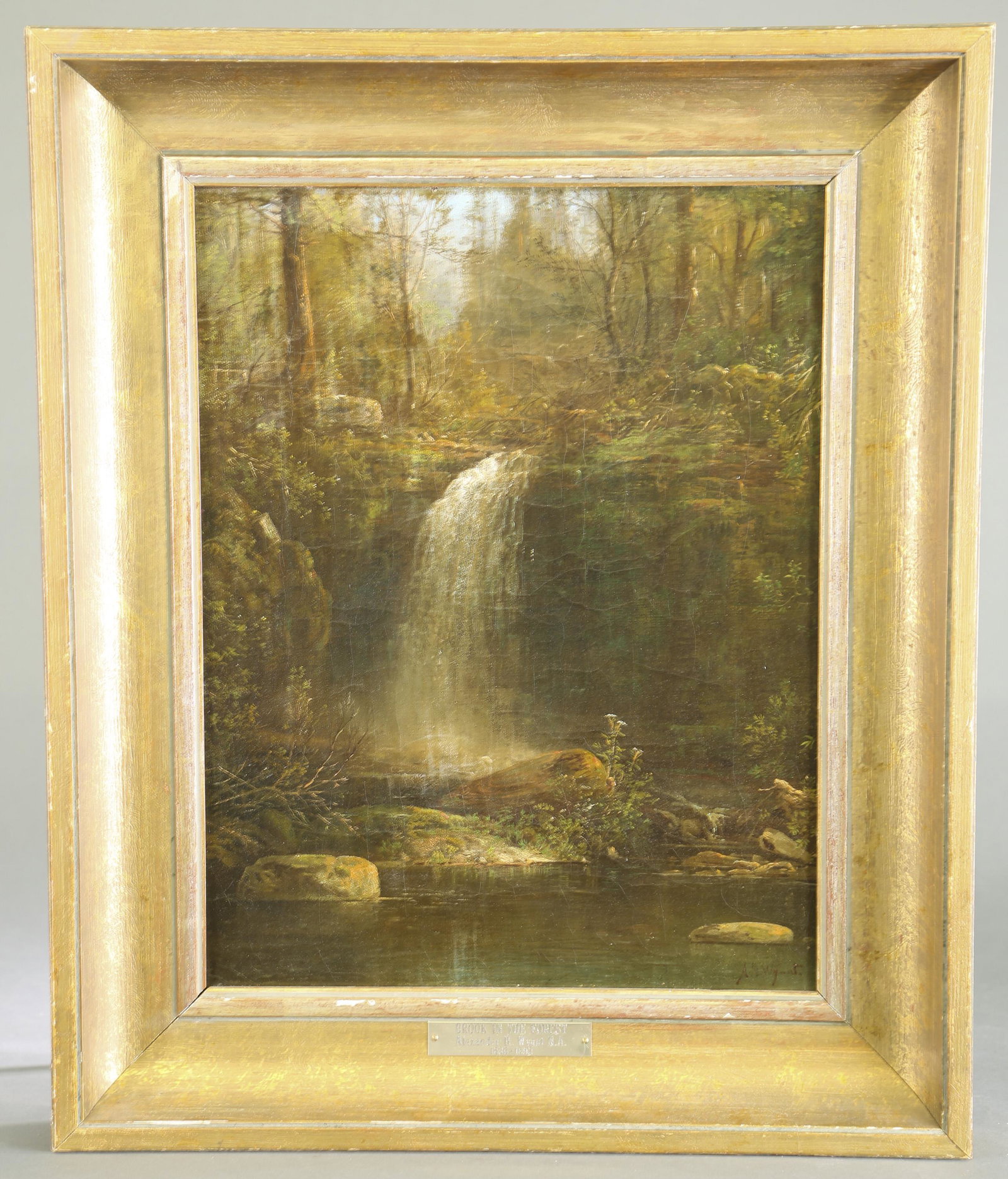 Alexander Wyant N.A. "Brook in the Forest," O/C: Wyant N.A., Alexander (American,1836-1892). "Brook in the Forest." Depicting a waterfall in a forest interior. Oil on canvas. Signed l.r. Sight: 17 1/4" x 13" Frame: 23 1/4" x 19 1/4".Provenance: Purc