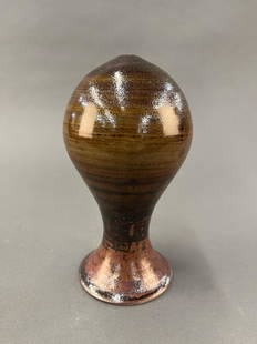 Paul Nash bud vase.: A Paul Nash (Hawaii) pottery bud vase in dark brown glaze. Signed "PAUL NASH 1981" on base. 7 1/4" x 4".Provenance: From The Estate of Marvin Oleshansky.