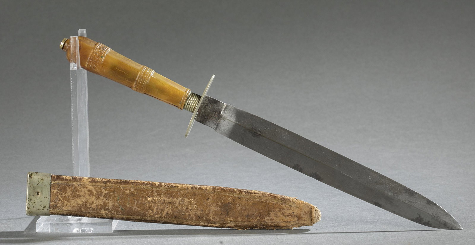 Joseph Gill, Sheffield knife and sheath.: A Joseph Gill, Sheffield knife and sheath. 9 3/8" spear point blade. Marked on ricasso "V [crown] R / JOSEPH GILL / PARLIAMENT ST. / SHEFFIELD" and on reverse "PER USO." Nickel silver crossguard. Yell
