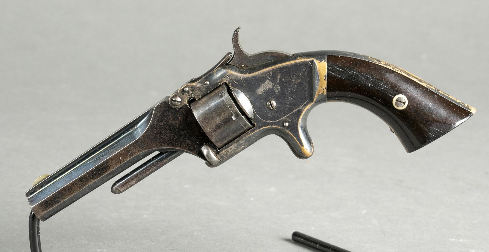 S&W No. 1 2nd Issue revolver, .22 Short.: [Antique Firearm] A Smith and Wesson No. 1 2nd issue single action revolver, .22 Rimfire Short. 3 3/16" barrel with markings "SMITH AND WESSON SPRINGFIELD MASS." Patent dates on cylinder "April 3, 55 