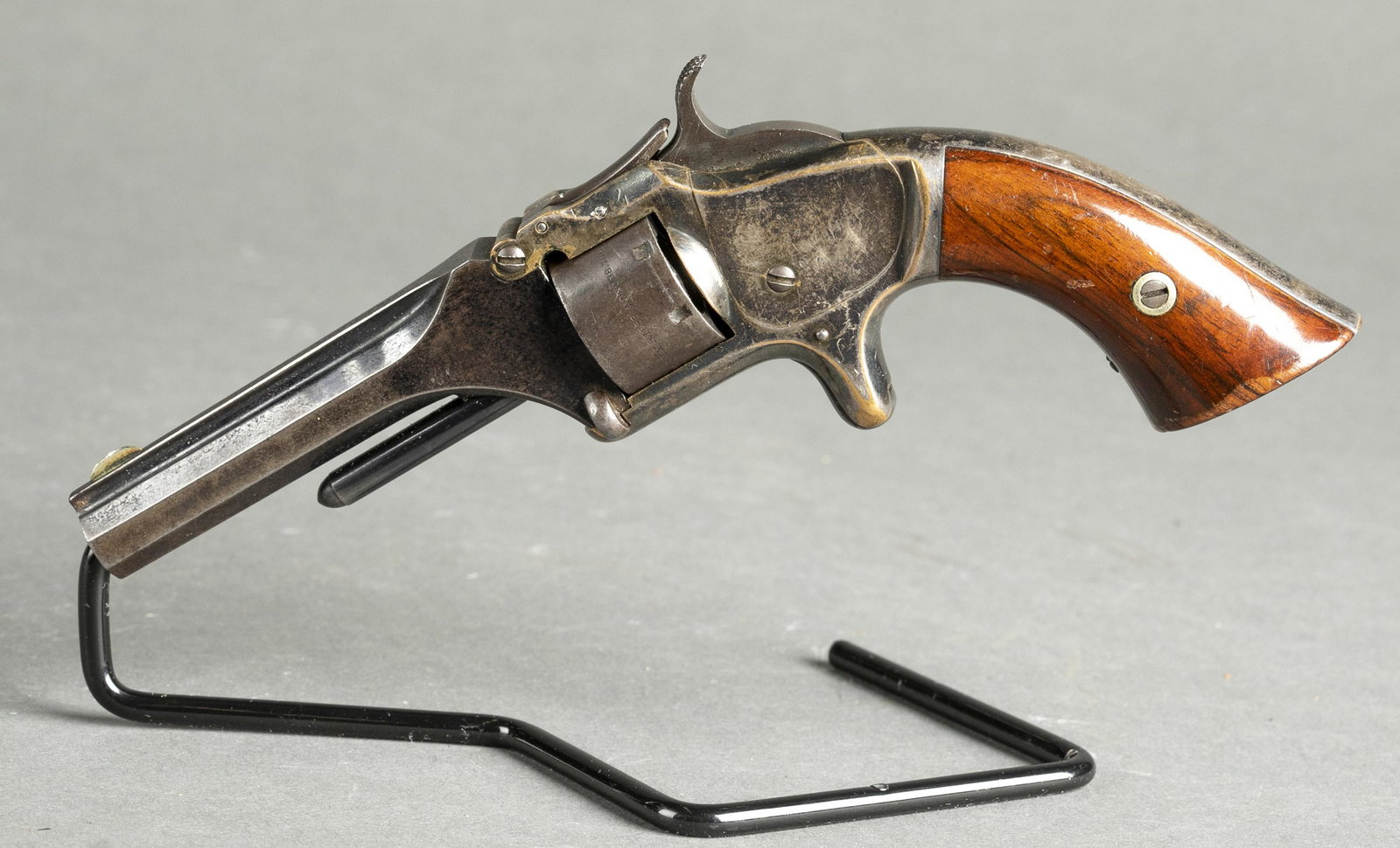 S&W No. 1 2nd issue revolver, .22 Short: [Antique Firearm] A Smith and Wesson No. 1 2nd issue single action revolver, .22 Rimfire Short. 3 3/16" barrel with markings "SMITH AND WESSON SPRINGFIELD MASS." Patent dates on cylinder "April 3, 55 