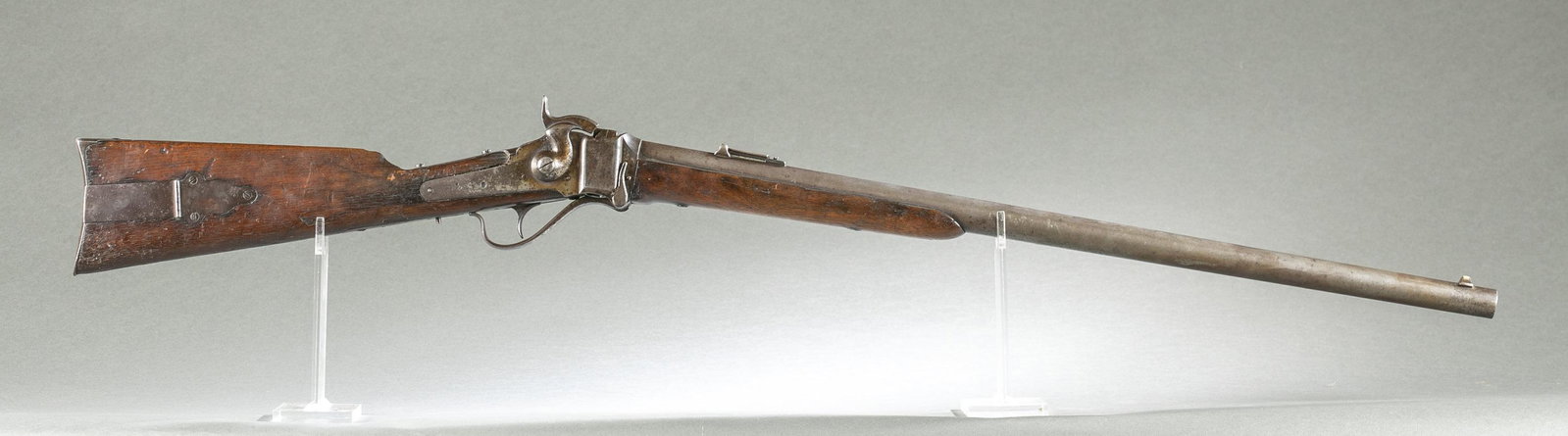 Sharps M1874 military carbine, .45: [Antique Firearm] A modified Sharps Model 1874 military carbine, .45. Receiver marked "SHARPS RIFLE CO/ PAT APR 6 1869." Features iron patch box. Serial number 101603. Mismatched 28" 45-70 Business Ri