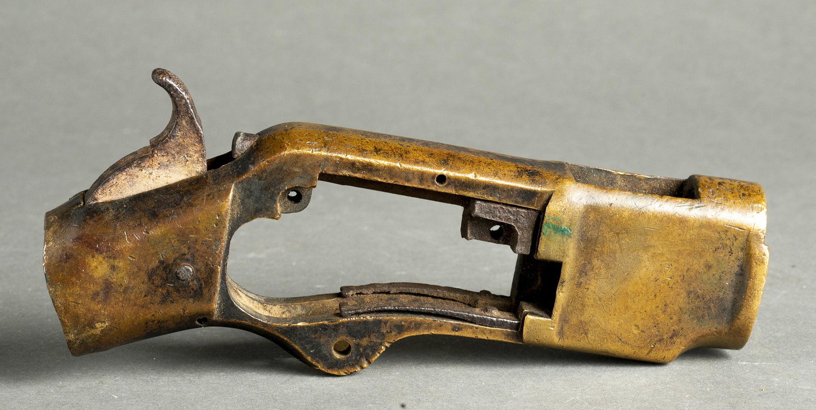 Winchester M1866 receiver.: Winchester Model 1866 brass receiver.Condition: Relic condition. Heavy wear. Mechanically not functioning. Rust on metal parts.