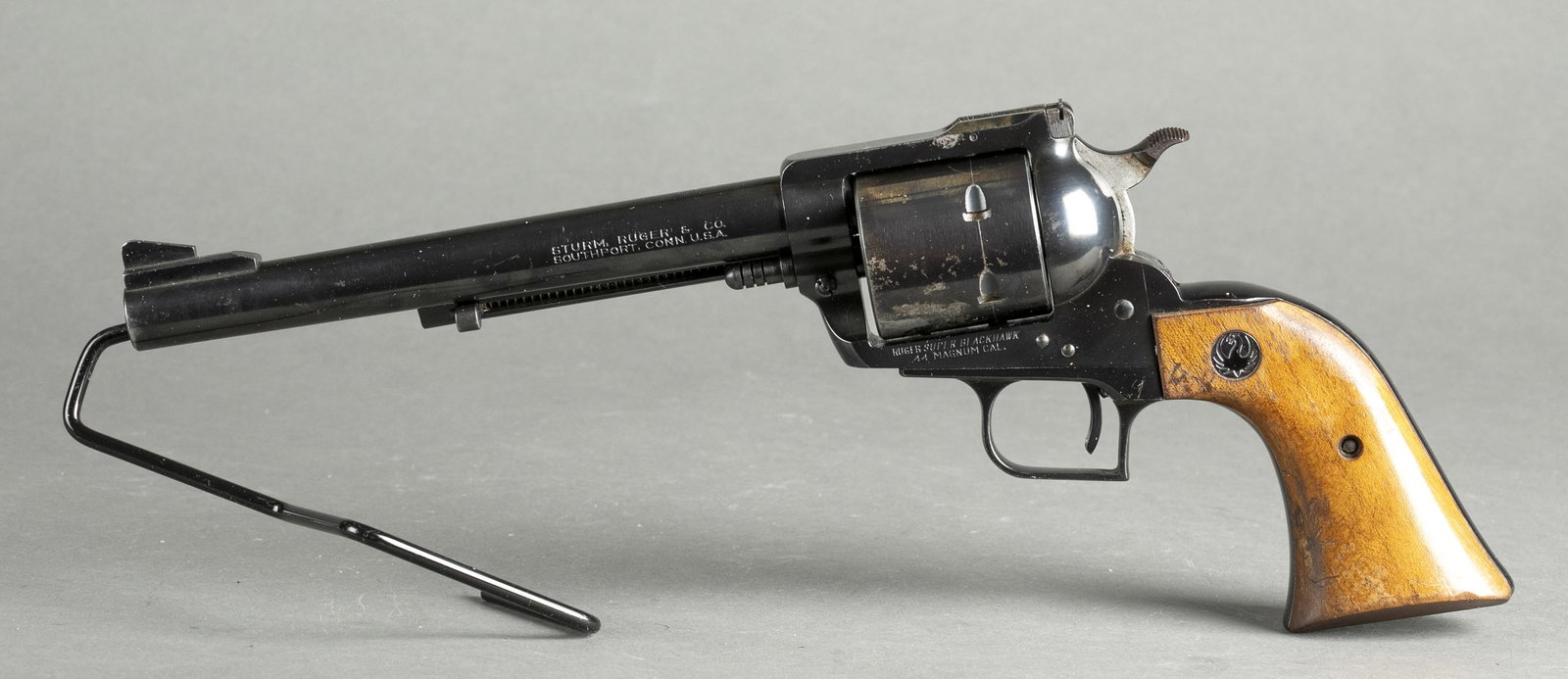 Ruger Old Model Super Blackhawk revolver, .44 mag: [Modern Firearm] A Strum, Ruger, and Co. Old Model Super Blackhawk revolver, .44 magnum. Manufactured in 1961. Blued barrel. 7 1/2" barrel stamped "Sturm, Ruger & Co. Inc. Southport, Conn. USA" Frame 