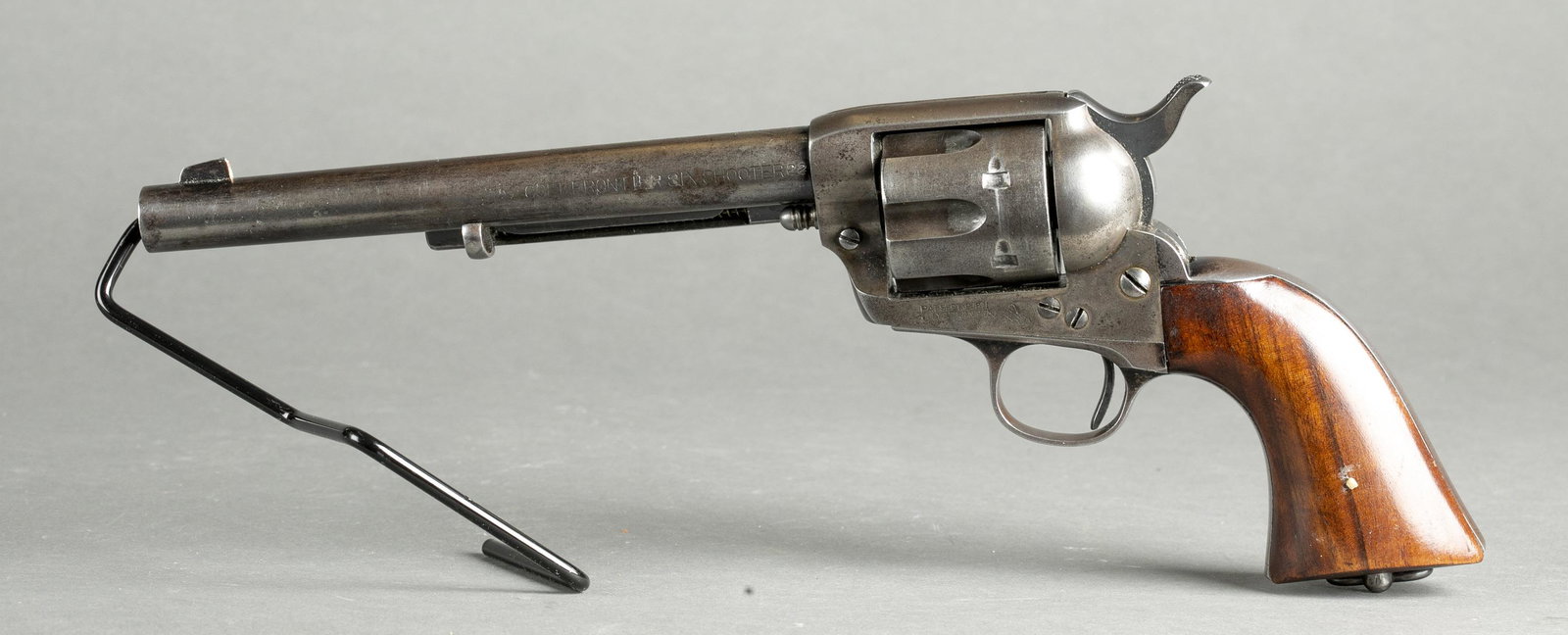 Colt Single Action Army revolver, .22 cal: [Modern Firearm] A rechambered Colt Single Action Army revolver, .22 caliber. Manufactured in 1906. Blued finish. 7 1/2" Colt address roll on top of barrel and marked on side "COLT FRONTIER SIX SHOOTE