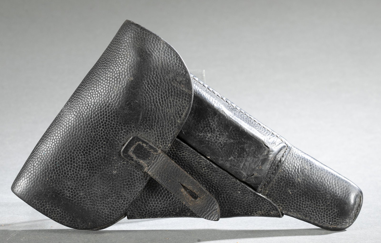 WW2 German P38 pig skin holster.: A WW2 German P38 pig skin soft holster. Joseph Moll manufacturer. Stamped "cxb/ 44?," WaA214 eagle, and P38. 9" long.