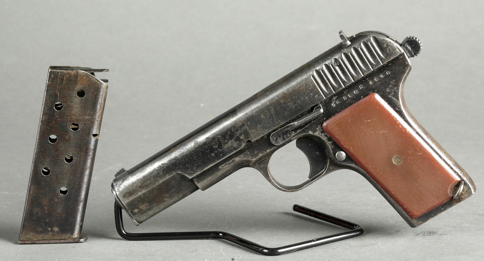 Soviet TT-33 pistol, 7.62×25mm: [Modern Firearm] A Soviet TT-33 semi-automatic pistol, 7.62×25mm Tokarev. 1940 wartime production, Tula arsenal. Not modified, no safety added for importation. No import mark, likely GI bring back. M