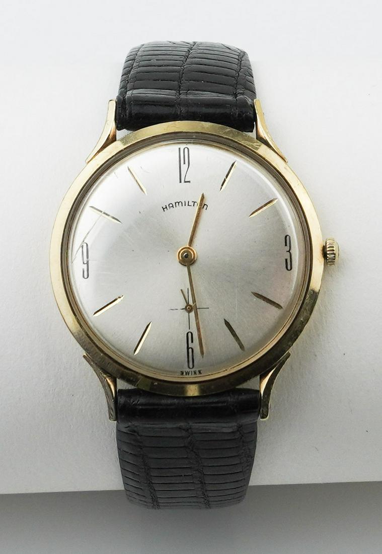 Vintage Hamilton Manual Wind Strap Watch: Vintage Hamilton Manual Wind Strap Watch, approx. 34.0mm gilt case, acrylic crystal, gilt markers/numerals and hands, seconds hands at 6:00 position, manual wind movement, leather strap
