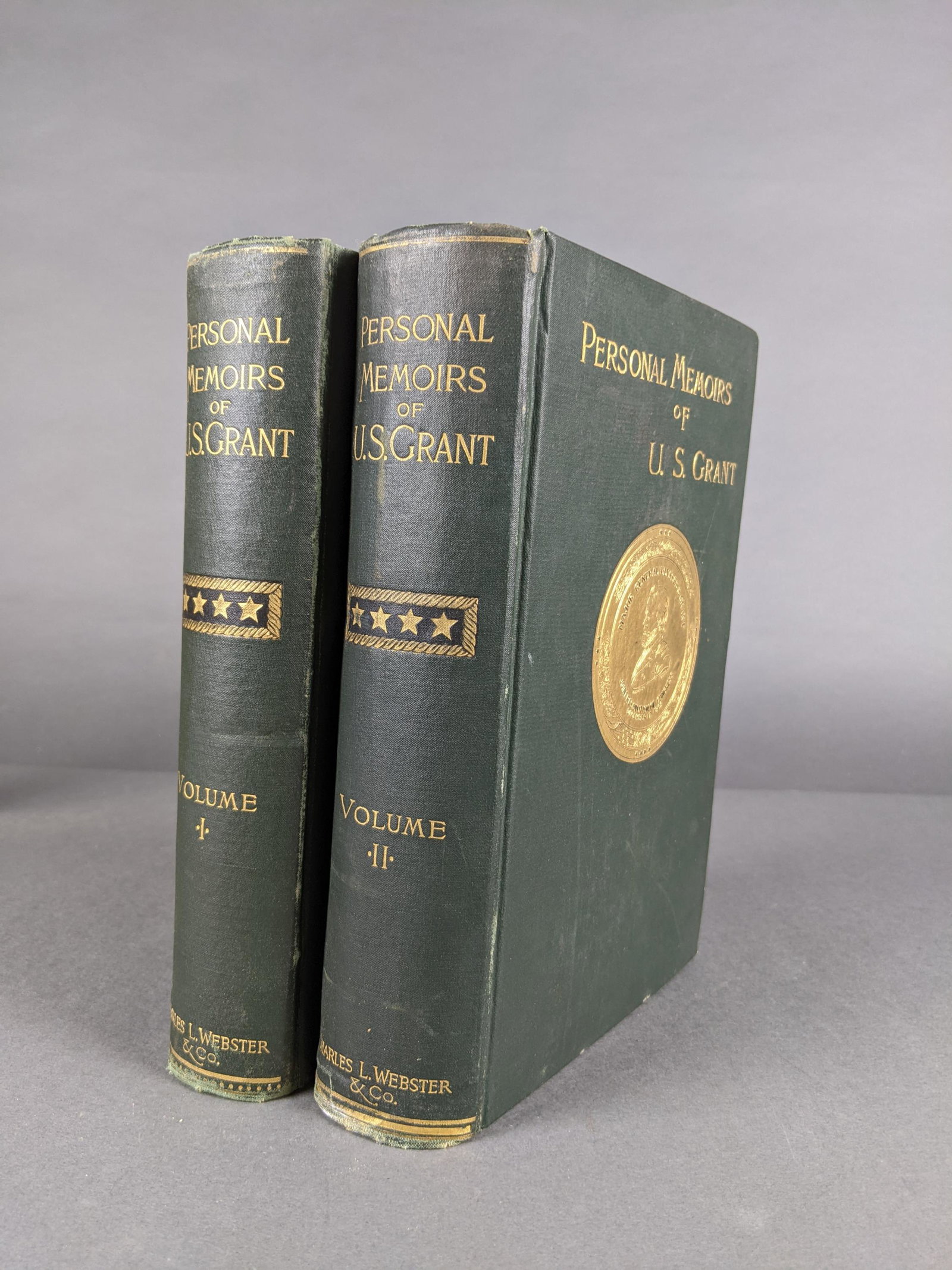 2 vols. Grant. Personal Memoirs. 1885.: [Biography] Grant, Ulysses S. Personal Memoirs of U.S. Grant. Charles L. Webster & Co., New York, 1885. 2 volumes. 8vo. Bound in green cloth with gilt text and medallion on cover.Condition: Minor rubb