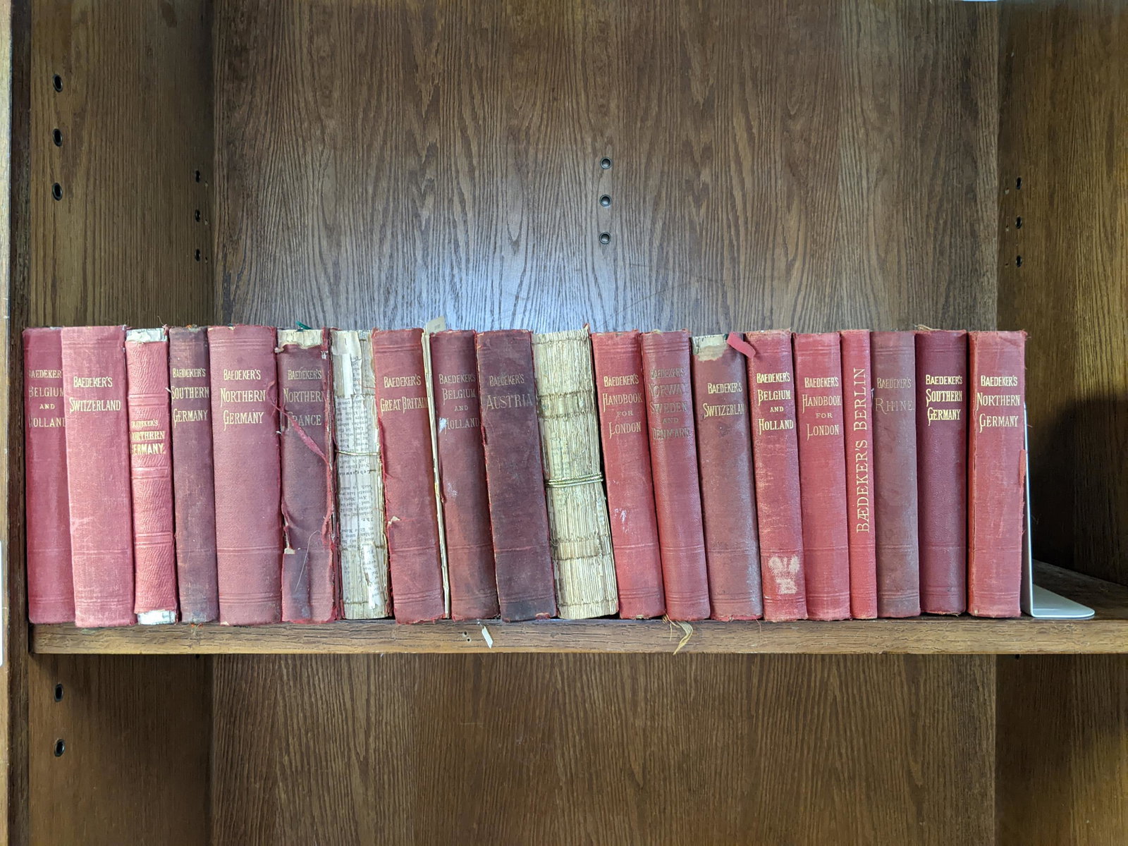 21 vols. Baedecker's Travel Guides.: [Maps/Travel] 21 volumes. Baedecker's Travel Guide. 12mo. Bound in original red cloth. All cover various regions and countries in Europe, including one Plans of the City of Rome and Berlin.Condition: 