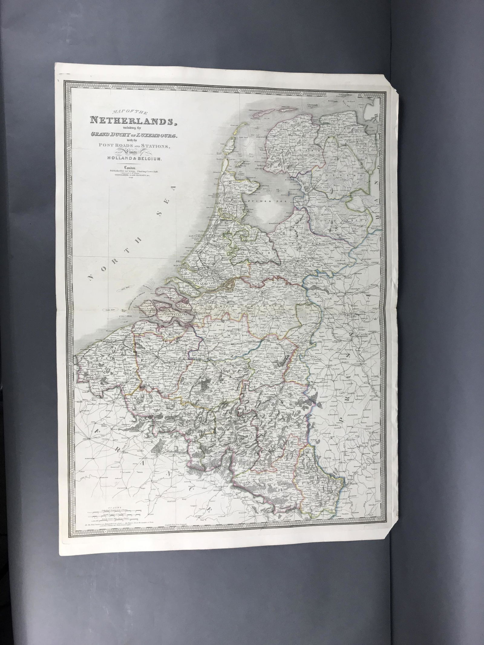 3 Maps of the Netherlands: [Map/Atlases] Wyld, James. Map of the Netherlands including the Grand Duchy of Luxembourg with the post roads and stations. London, 1843. Steel engraved map. Hand colored outline. Measures 23 1/4" x 3