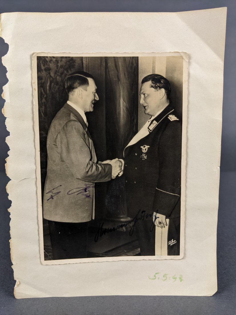 Hitler and Goring Signed Photograph.: [WWII] Goring, Hermann Wilhelm Goring (1893-1946) and Hitler, Adolf (1889-2945) Silver gelatin photograph. Signed in pen by both Hitler and Goring over their respective images. Photo: 4 1/8" x 5 3/4".