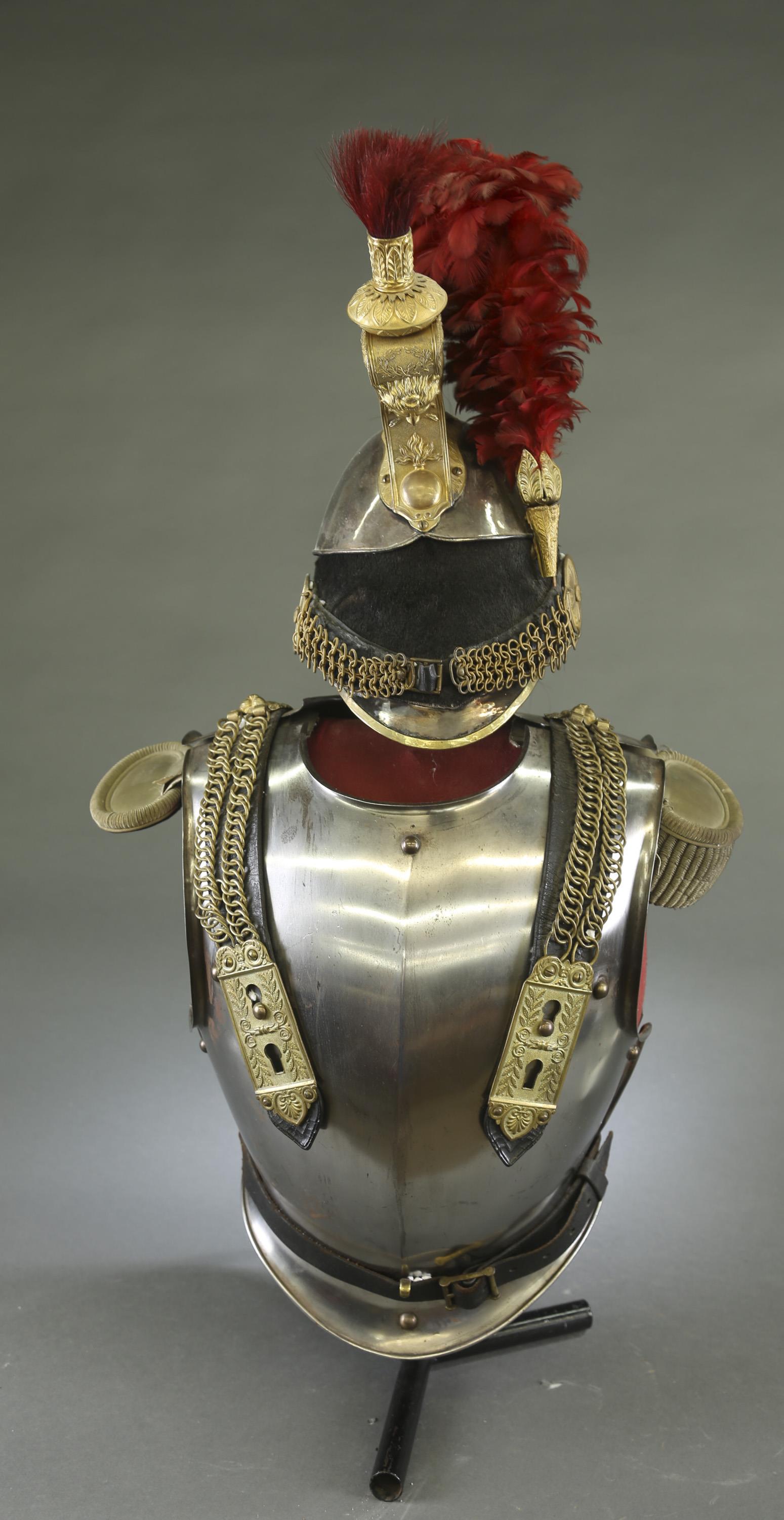 French officer's cuirassiers breastplate and helm.: A French Kingdom July Monarchy officer's cuirassiers assemble breastplate and helm. Circa 1840. Model 1840 gilt crested helmet sea cow hide turban, vulture feather flume, and horse hair plume. Front a