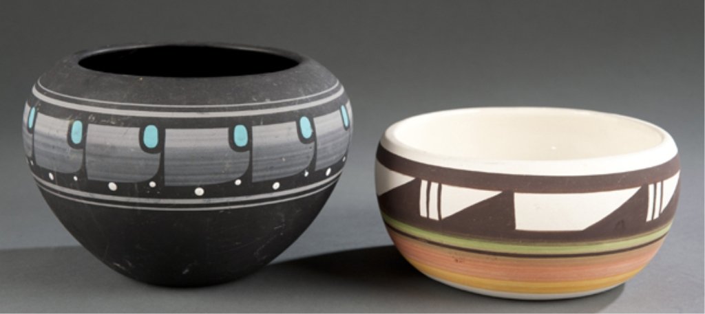 Group of 2 Native American bowls.: Group of 2 Native American bowls. 20th century. ++ Ute Mountain Tribe bowl painted with repeating motifs in dark brown at the top. With green, pink and mustard colored accent colors. Marked "UTE MTN T