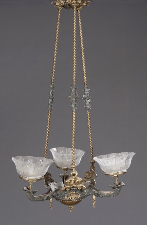 Late 19th/E. 20th C. Converted Gas Chandelier: Converted gas chandelier. Late 19th/early 20th century. Three arm early gas light with snake ormolu, converted to electric. 42"h x 23 1/2"w. Condition: Good.