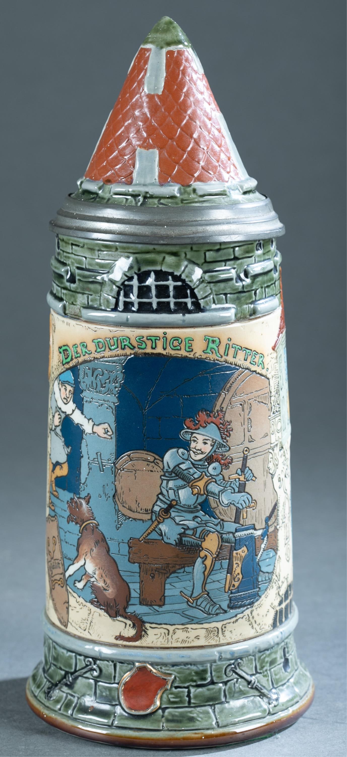 Mettlach H.Schlitt #2382 The Thirsty Knight stein: A Henry Schlitt (German, 1849-1923) for Mettlach “Der Durstice Ritter/ The Thirsty Knight” No. 2382 1 liter ceramic stein. Signed on front. Marked on bottom. Pewter mounts. 11 1/2" x 6 1/2" x 4 3/