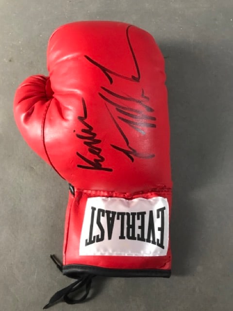 Mike Tyson Autographed Glove: .