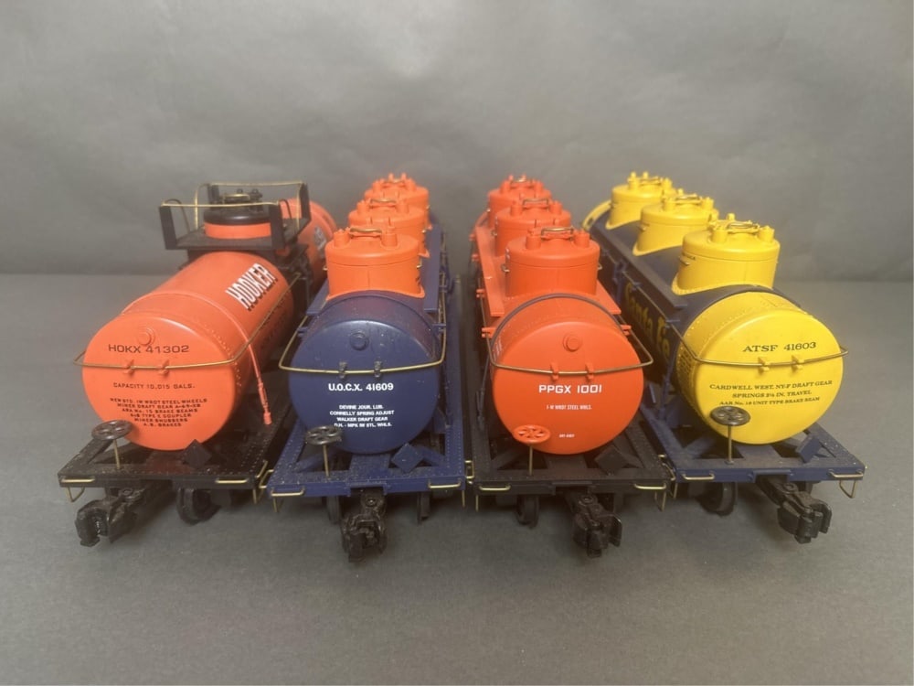 Aristo Craft triple and single dome tank cars (4 t: Aristo Craft triple and single dome tank cars (4 total) Car numbers: 41603 (decorative wheel on front is loose), 41609, 41617, and 41302 (measured) R2 15W 3.75D 6H All Train and Train accessories in t