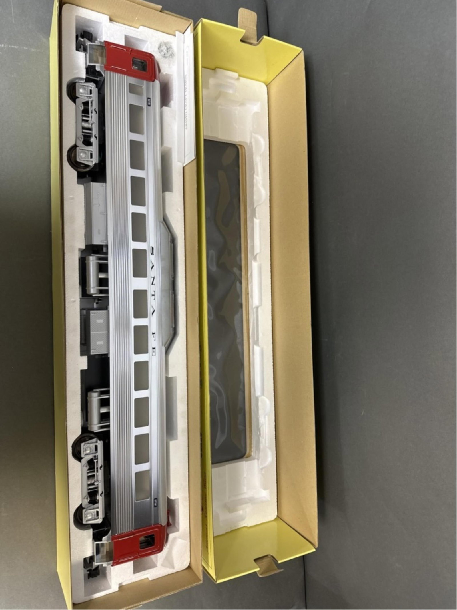 Aristo craft Rail Diesel Car - ATSF/Santa Fe - ART: Aristo craft Rail Diesel Car - ATSF/Santa Fe - ART 22810 Comes with original box and original shipping box, one window needs repair and is swinging in the door (pictured) R8 31W 4D 6.5H All Train and 