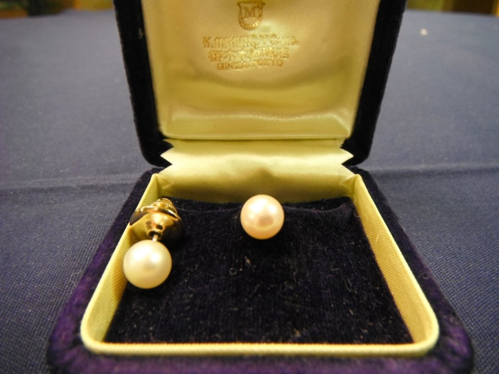 Mikimoto pearl earrings, mismatched pair.: Mikimoto pearl earrings, mismatched pair.