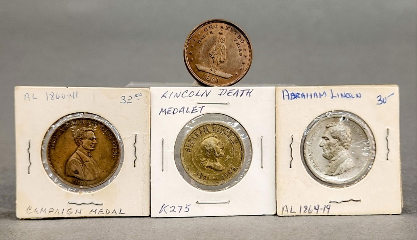 4 1860/1864 Election and Abraham Lincoln medals: A group of four 1860 Election and Abraham Lincoln medals. ++ 1860 Campaign Medal. Obverse: "HON. ABRAHAM LINCOLN/ 1860" Bust right. Reverse: "THE RAIL SPLITTER OF THE WEST." VF ++ Obverse: "HARTFORD W