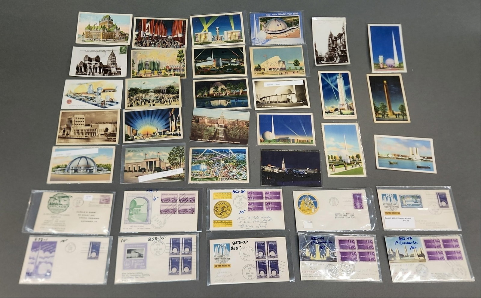 World's Fair ephemera, early 20th c.: A group of World's Fair ephemera from the early 20th century. Including postcards and first day of issue stamps from 1924, 1931, 1933, 1935, 1936, 1937, and 1939.