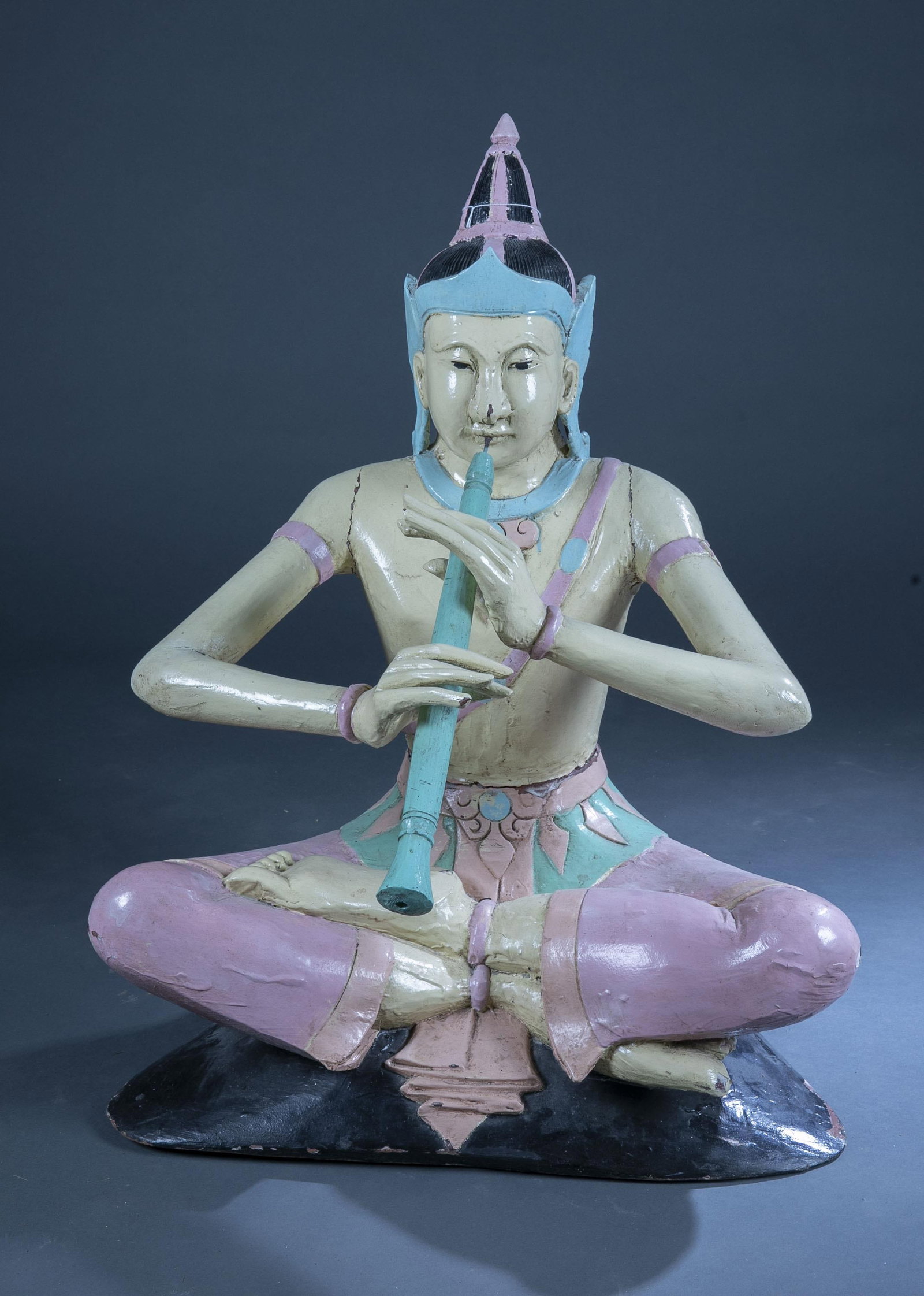 Seated figure with oboe. (1 of 5)