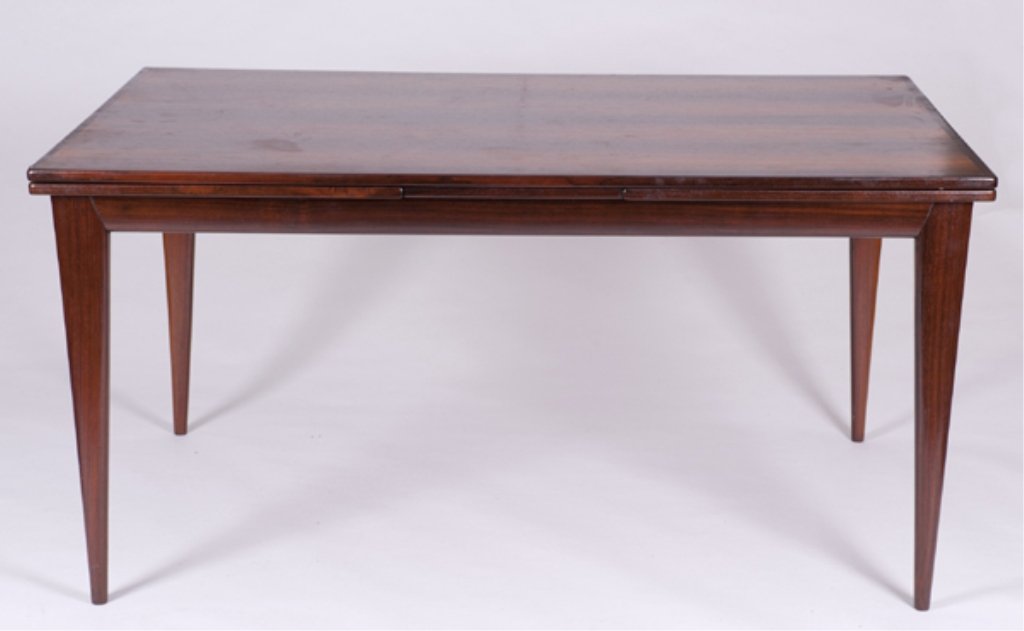 J.L. Moller Danish Modern draw leaf dining table.: A J.L. Moller Danish Modern rosewood draw leaf dining table. 20th century. 29"h x 59"w x 39"d.
