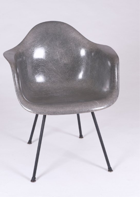 Eames fiberglass armchair with rope edge.: A Charles Eames for Herman Miller fiberglass armchair with rope edge. Mid. 20th century. Retains paper label. 31'h" x 24 3/4''w x 24''d.