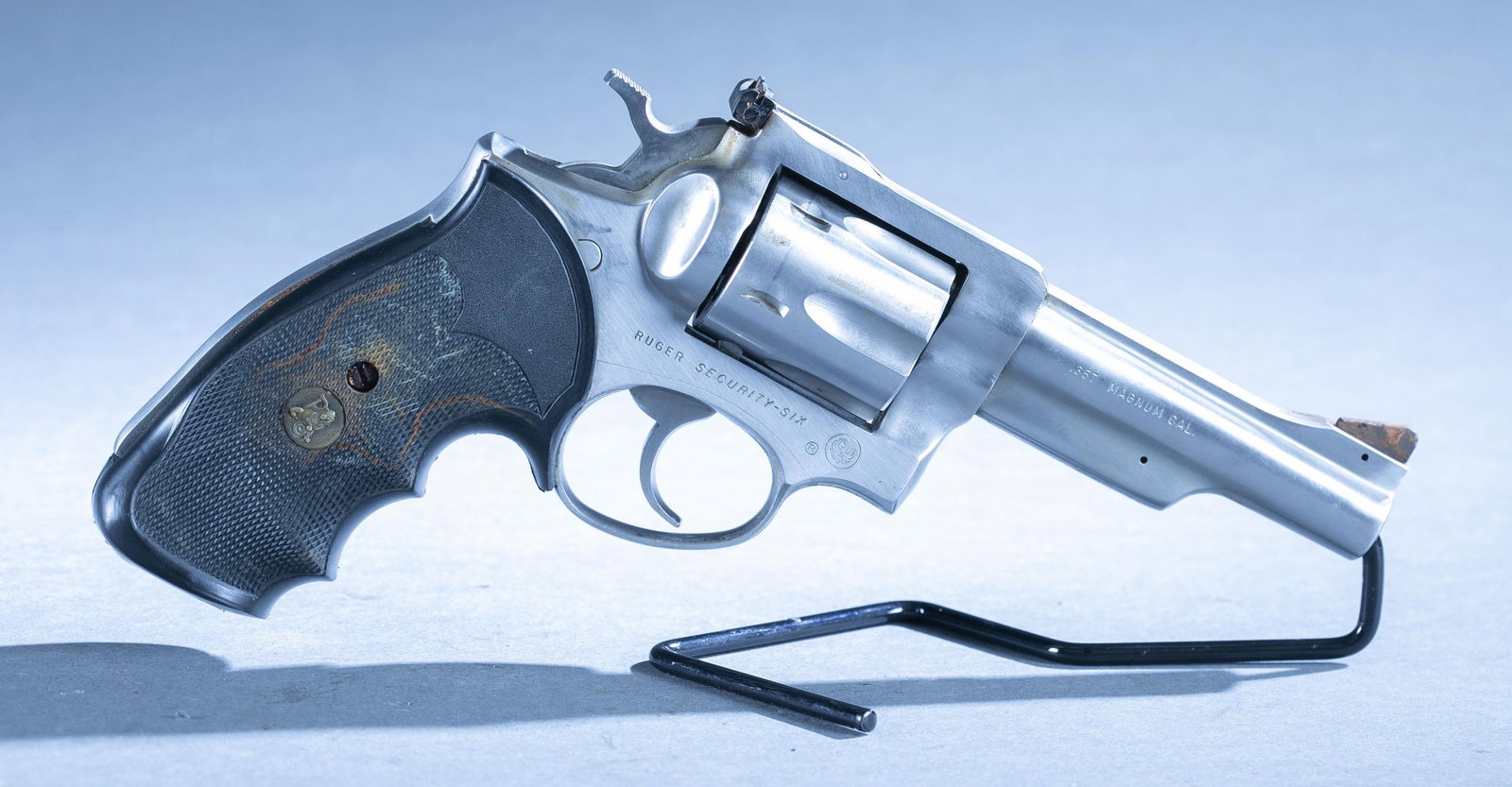 Ruger Security-Six revolver, .357 Magnum: A Ruger Security-Six double action revolver, .357 Magnum. Stainless steel finish. 4" barrel. Pachmayr rubber grips. Serial: 160-90***. 9" overall. Condition: Good condition. Rust on sights and screws.