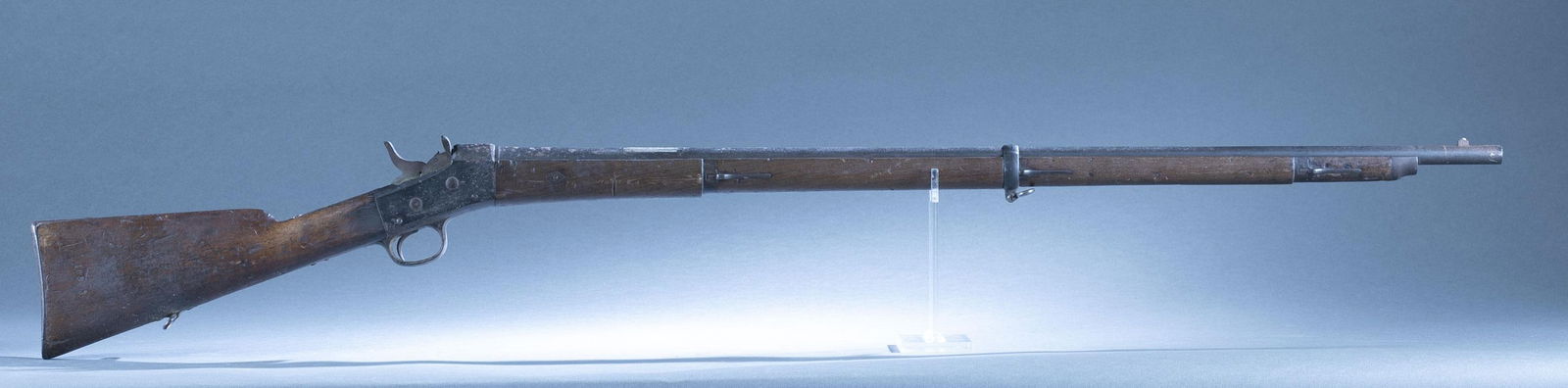 Spanish M1871/89 rolling block rifle, 11.4mm: An antique Spanish Fusil Remington Model 1871/89 Reformado rolling block rifle, 11.4mm Reformado. 37" barrel with "R" mark. Action crown over "AR/ 1879." JG cartouche on action. 51 3/4" overall. Condi