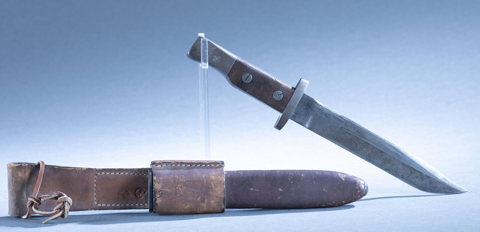 Canadian Ross M1905 bayonet fighting knife: A Canadian Ross Model 1905 bayonet converted into fighting knife. 7 3/8" clip point blade. Leather covered scabbard and frog. 12" overall. 13 1/2" scabbard.