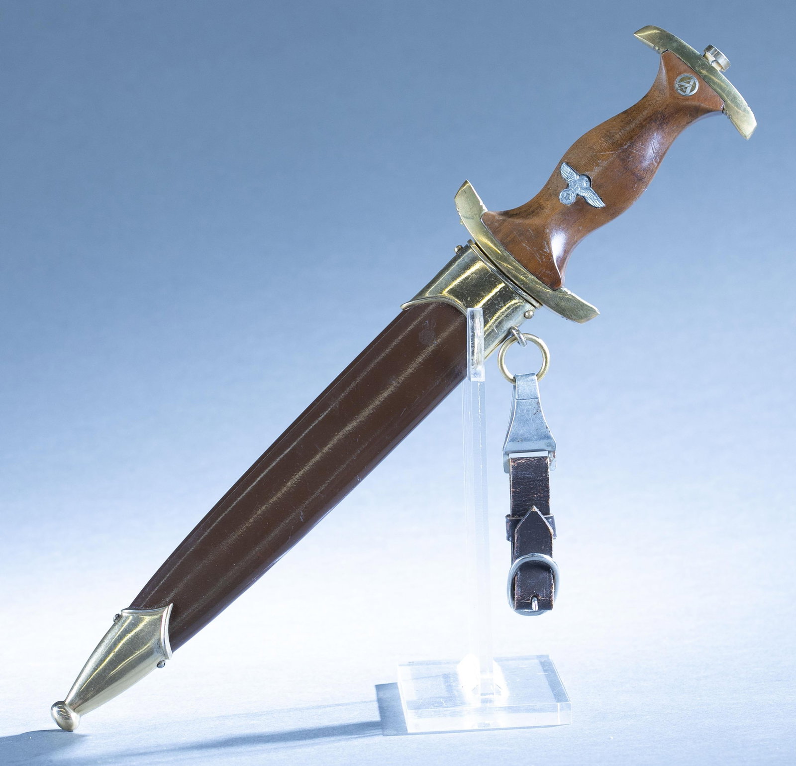 WWII M1933 German SA honor dagger with scabbard: A WWII German Model 1933 SA honor dagger with scabbard and hanger. 8 1/2" double edged blade. Blade acid etched "Ulles fur Deutschland." Ricasso marked "807/37" over RZM. Brass crossguard and pommel. 