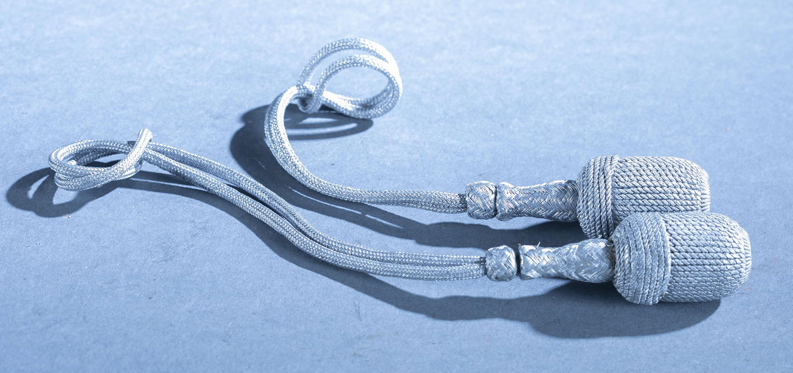 2 WWII German portepee dagger knots: A group of two WWII German Army and SS silver-aluminum thread portepee dagger knots.